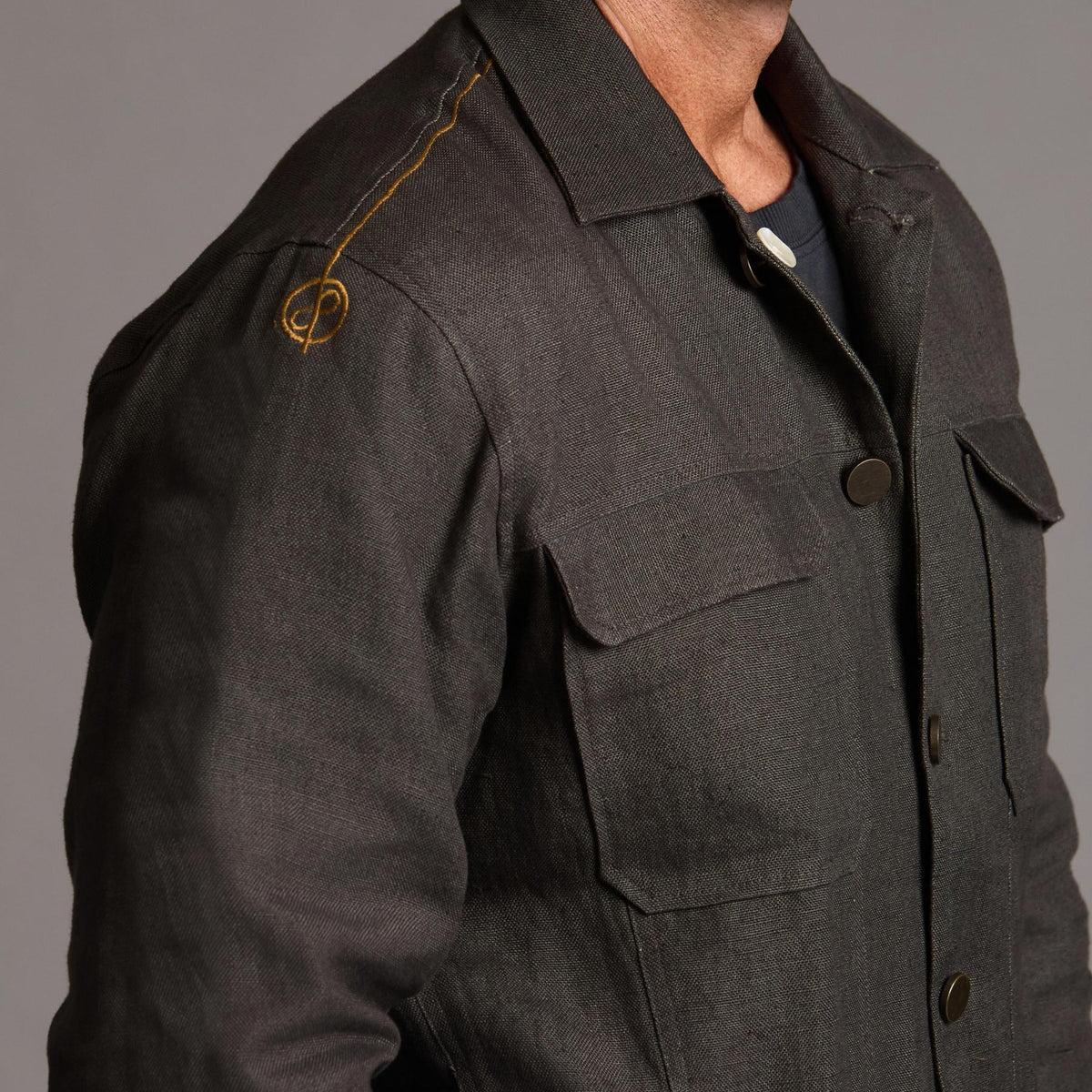 Male modeling smoke axis jacket