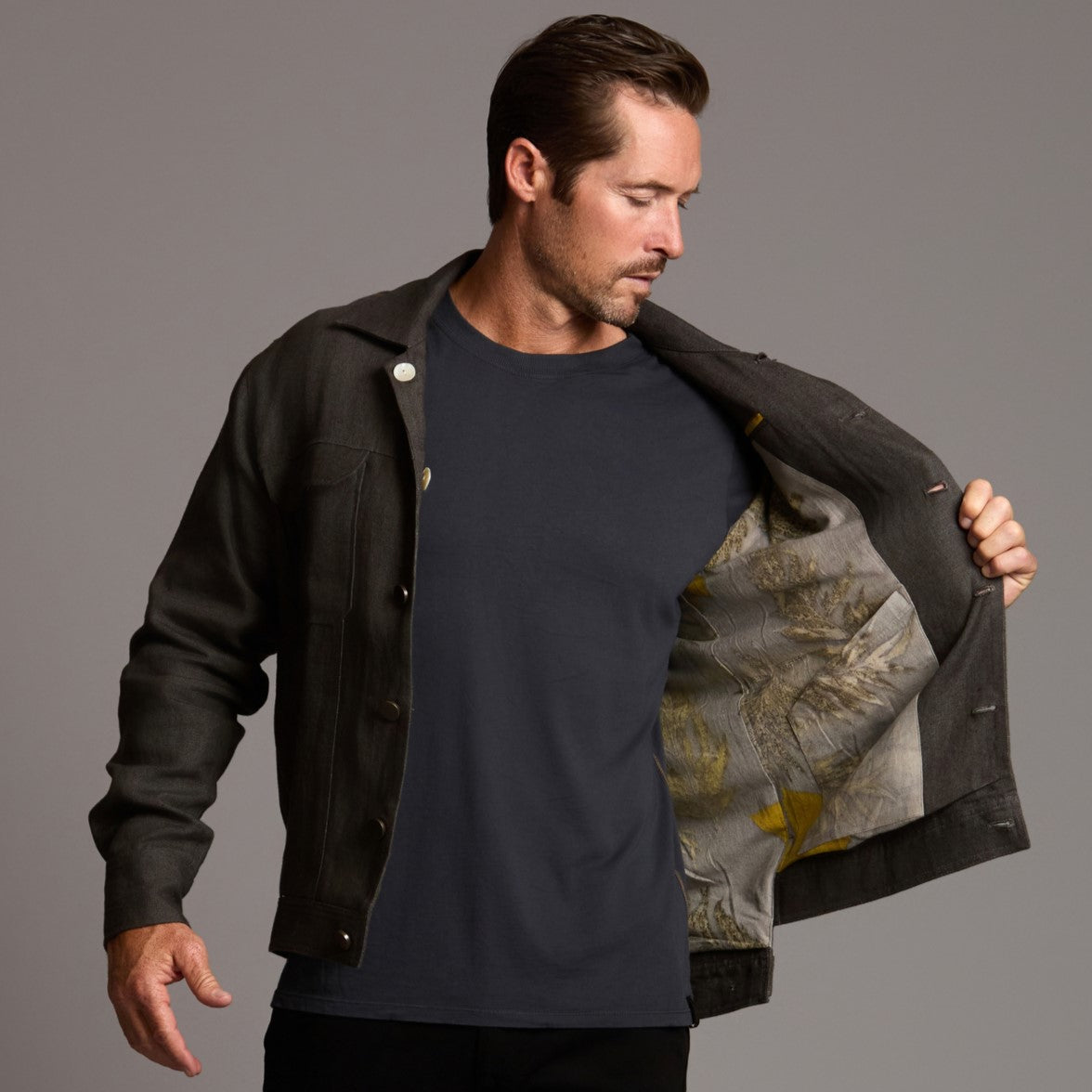Male modeling smoke axis jacket