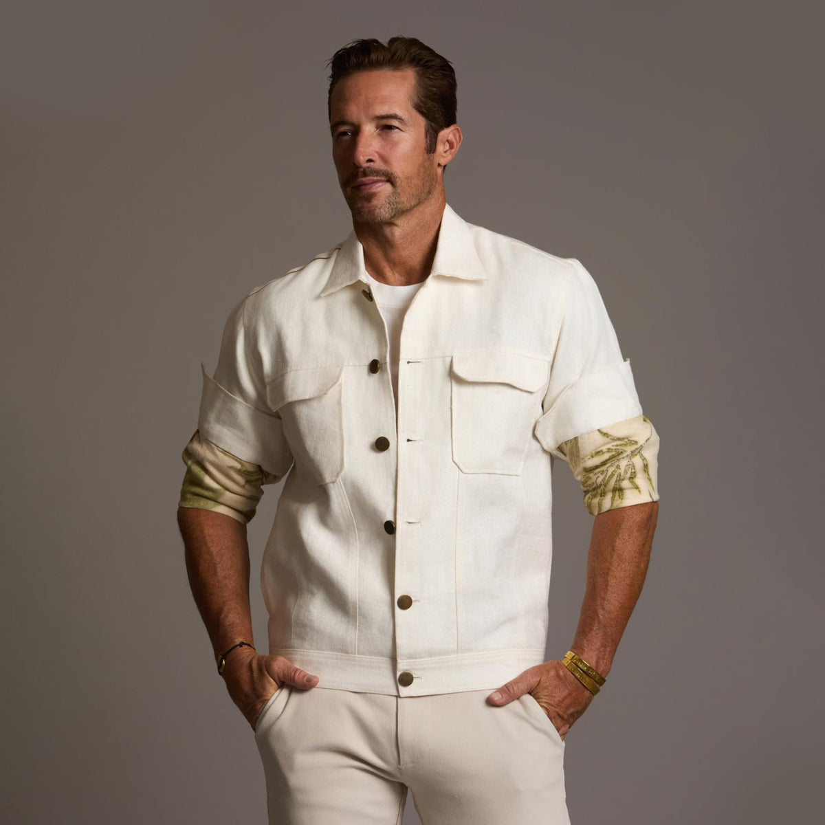 Male modeling white axis jacket