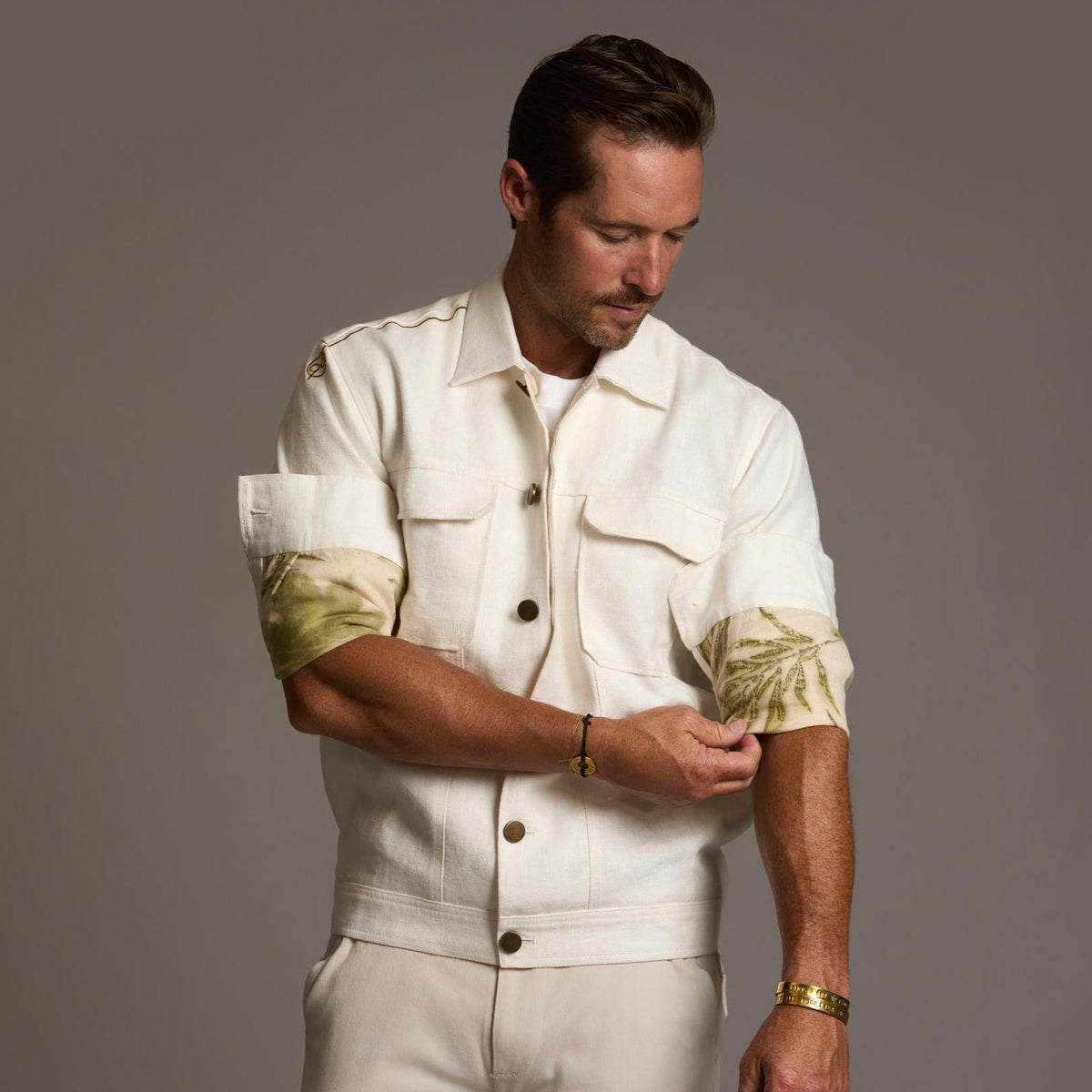 Male modeling white axis jacket