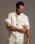 Male modeling white axis jacket