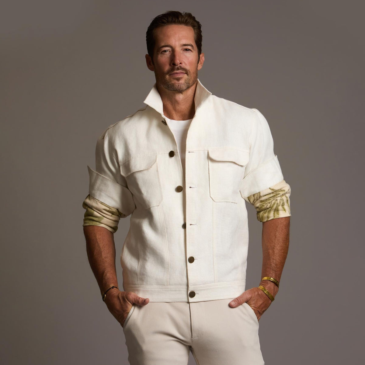 Male modeling white axis jacket