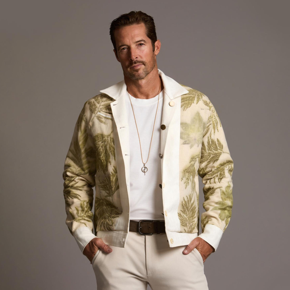 Male modeling white axis jacket