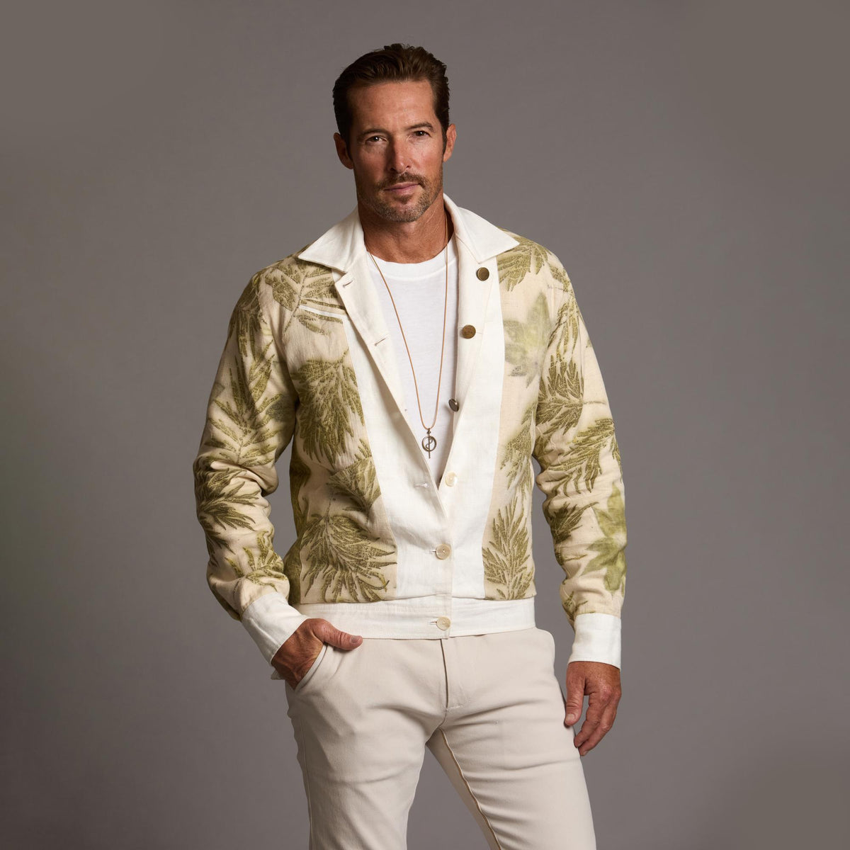 Male modeling white axis jacket