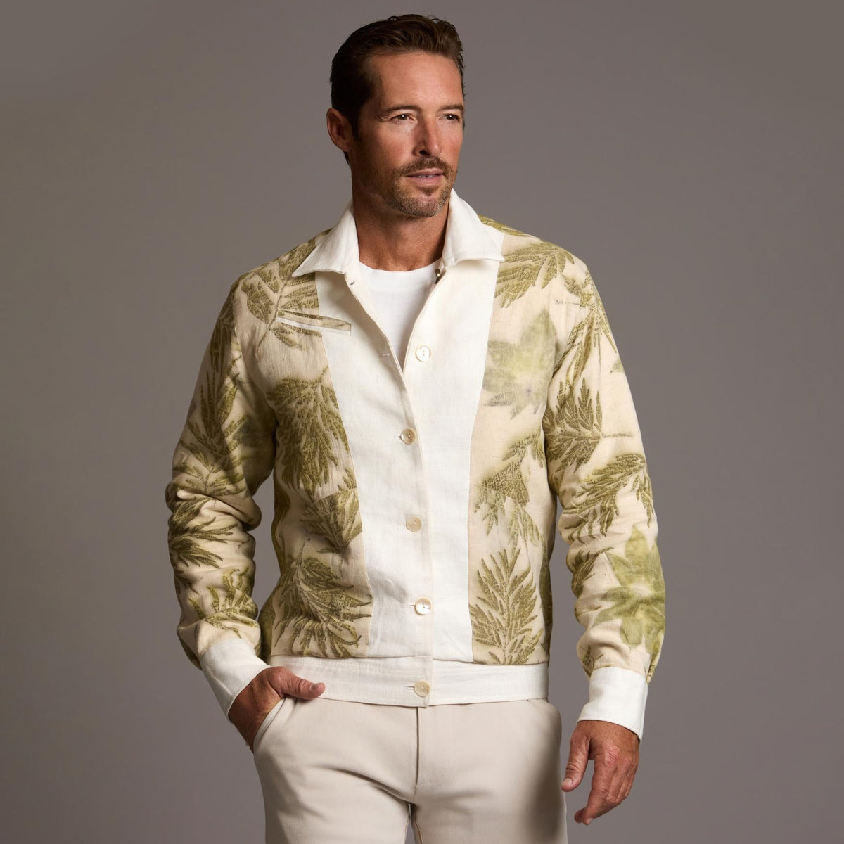 Male modeling white axis jacket