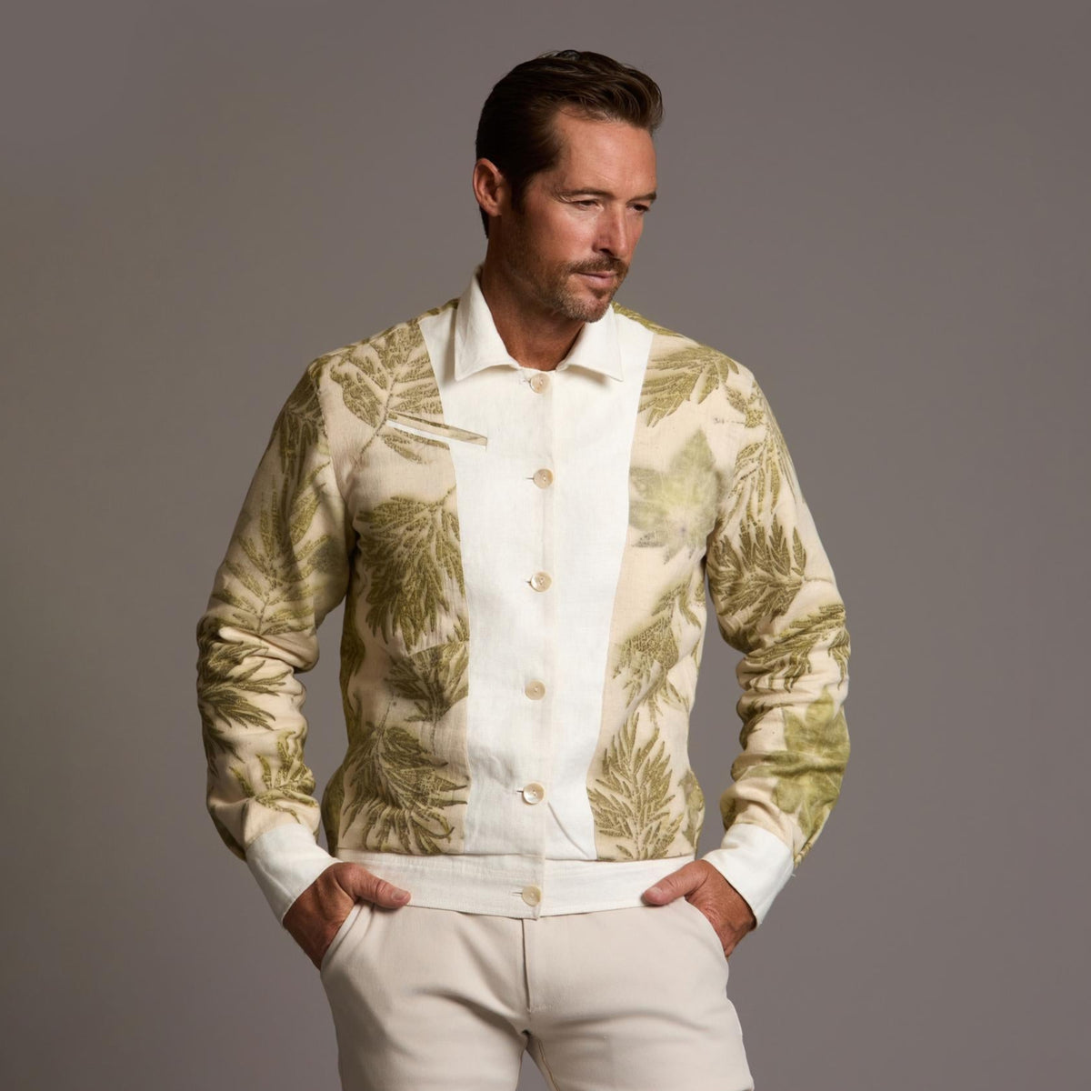 Male modeling white axis jacket