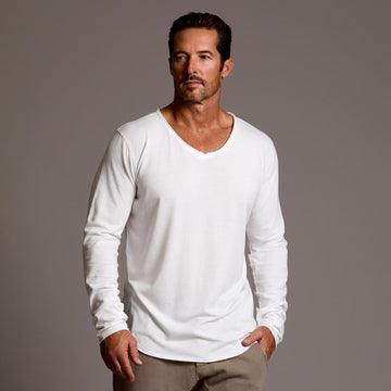 Man modeling white v neck long sleeve