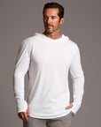 Man modeling white long-sleeve hooded tee