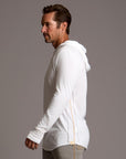 Man modeling white long-sleeve hooded tee