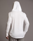 Man modeling white long-sleeve hooded tee