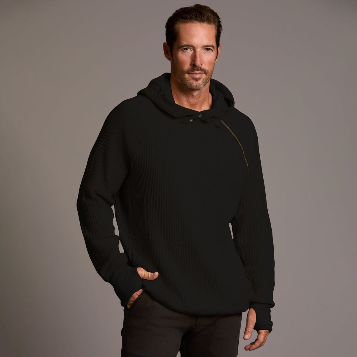 A man modeling a Oversized pullover shirt in black