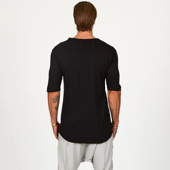 Male modeling black crew neck shirt 