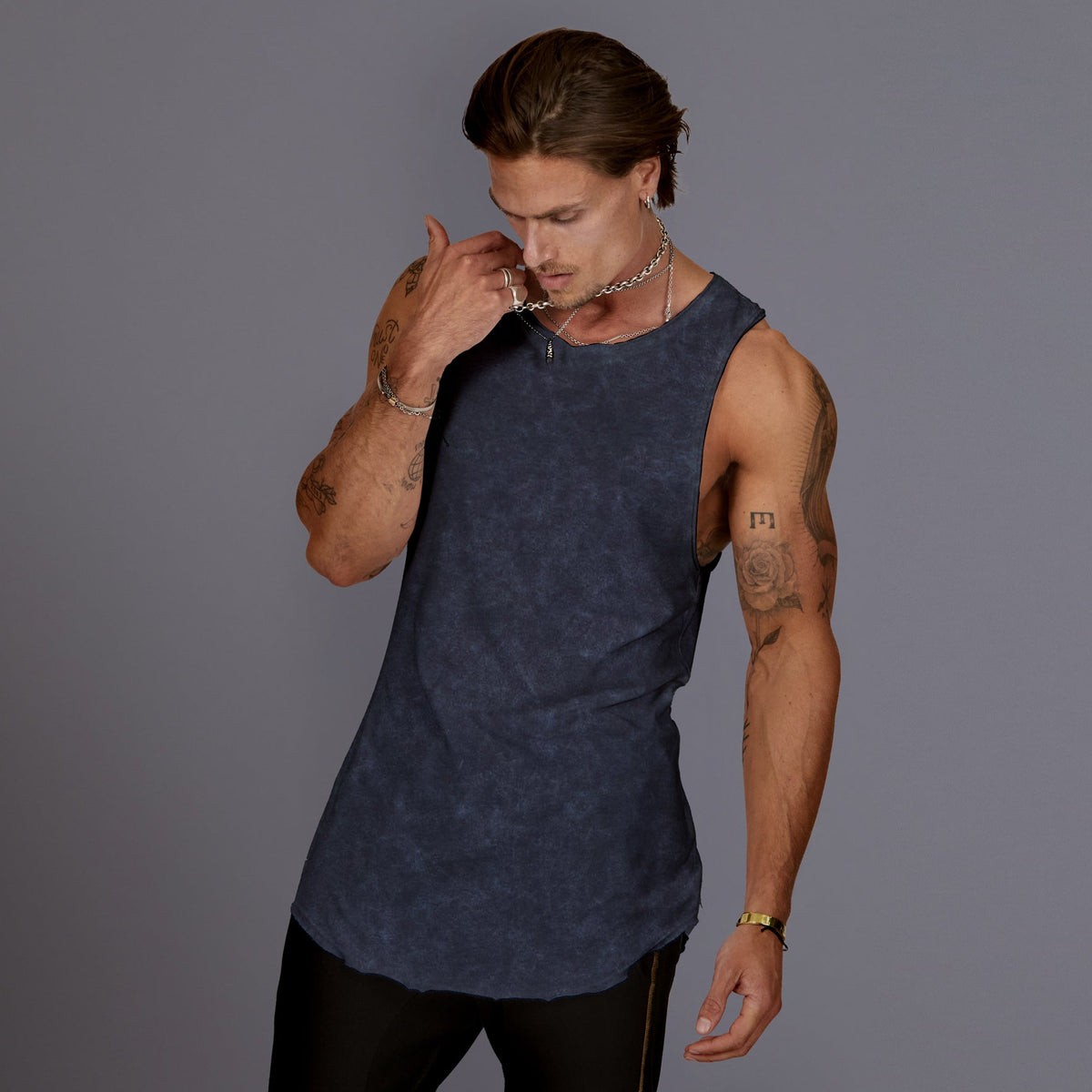 male modeling blue mineral tree tank