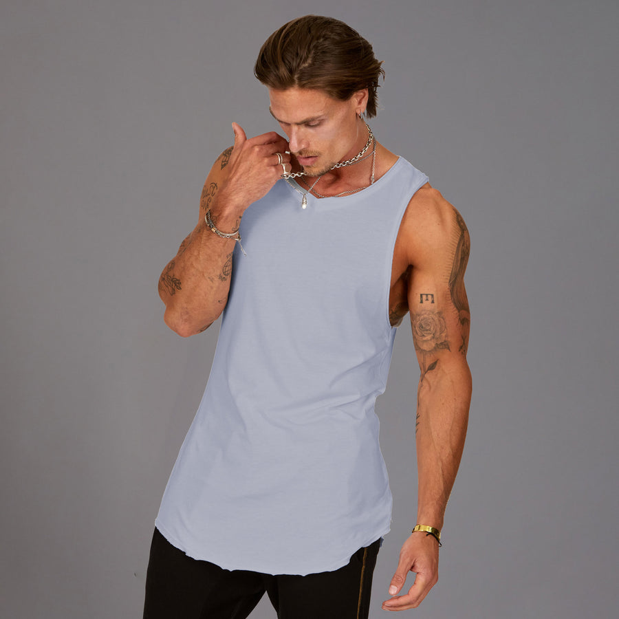 Man modeling a Clay blue tank top