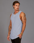 Man modeling a Clay blue tank top