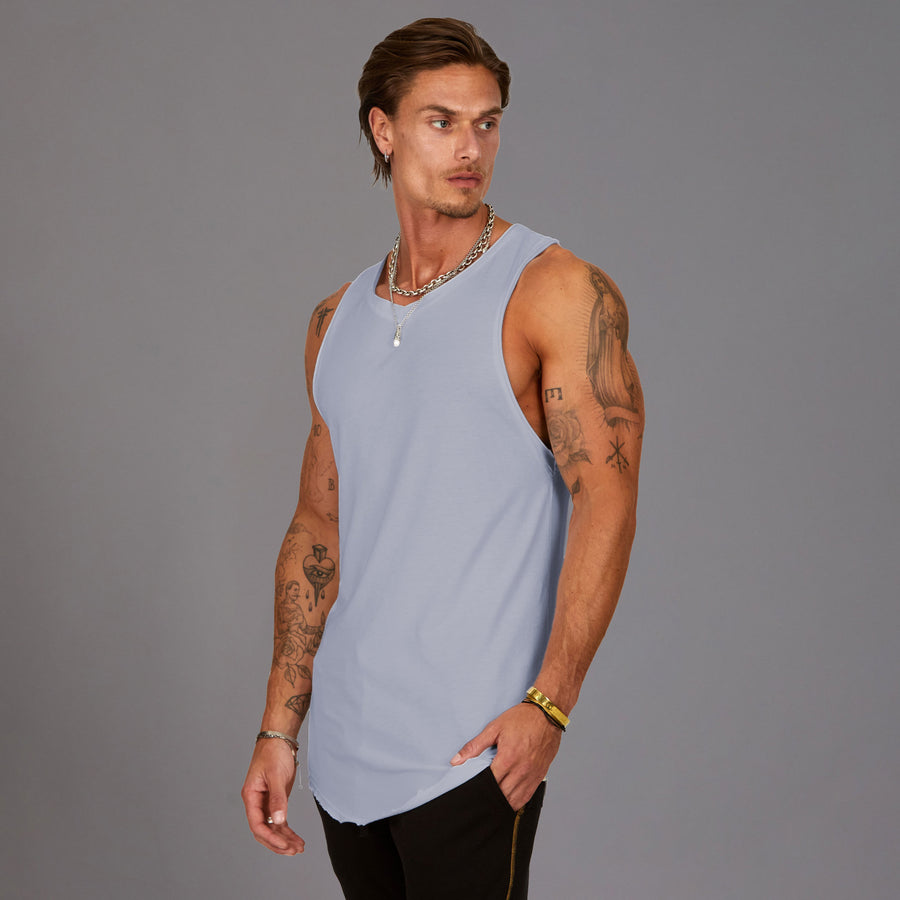 Man modeling a Clay blue tank top