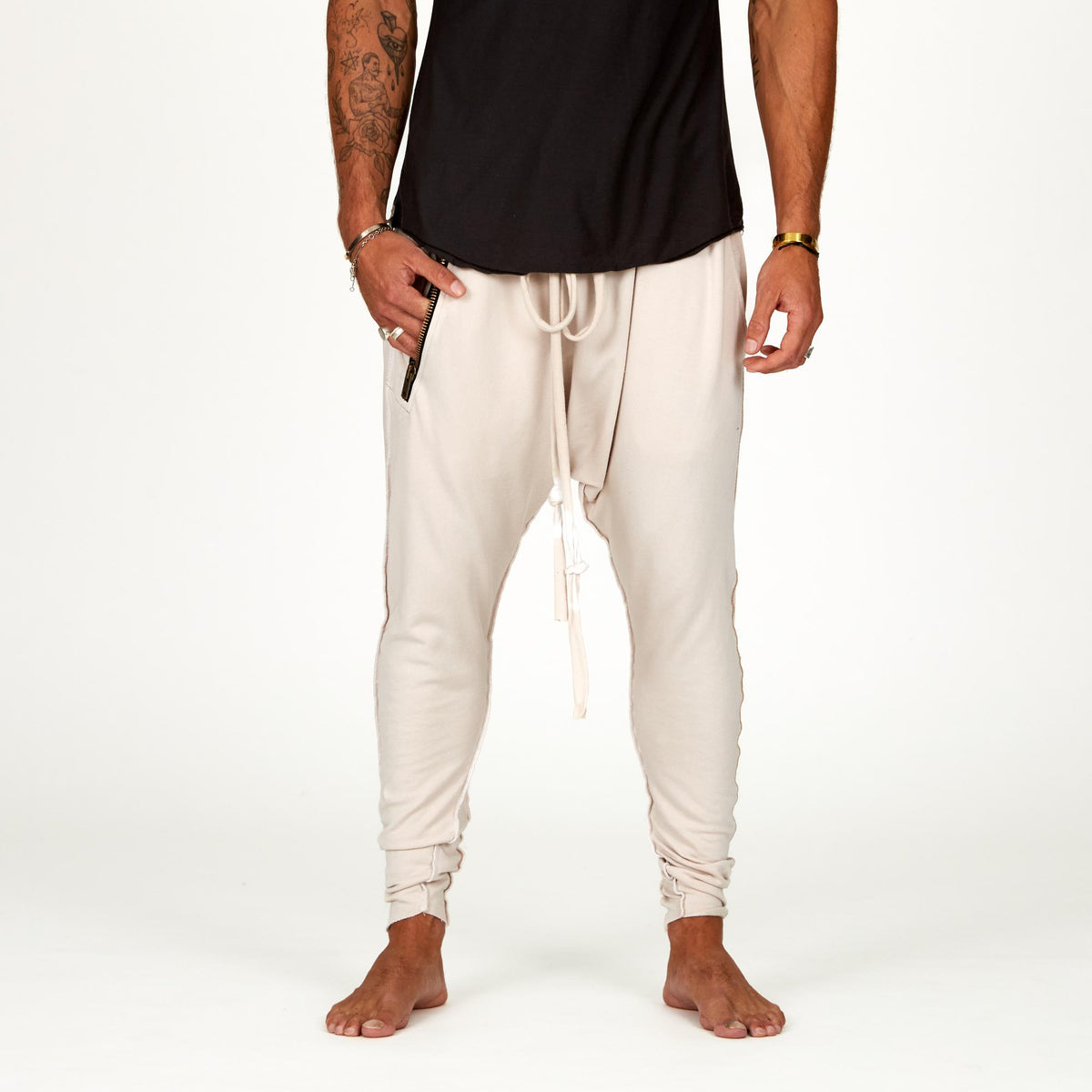Male modeling White Stone colored pants