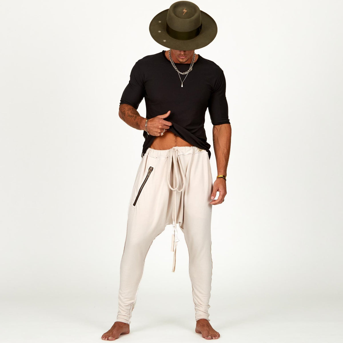 Male modeling White Stone colored pants
