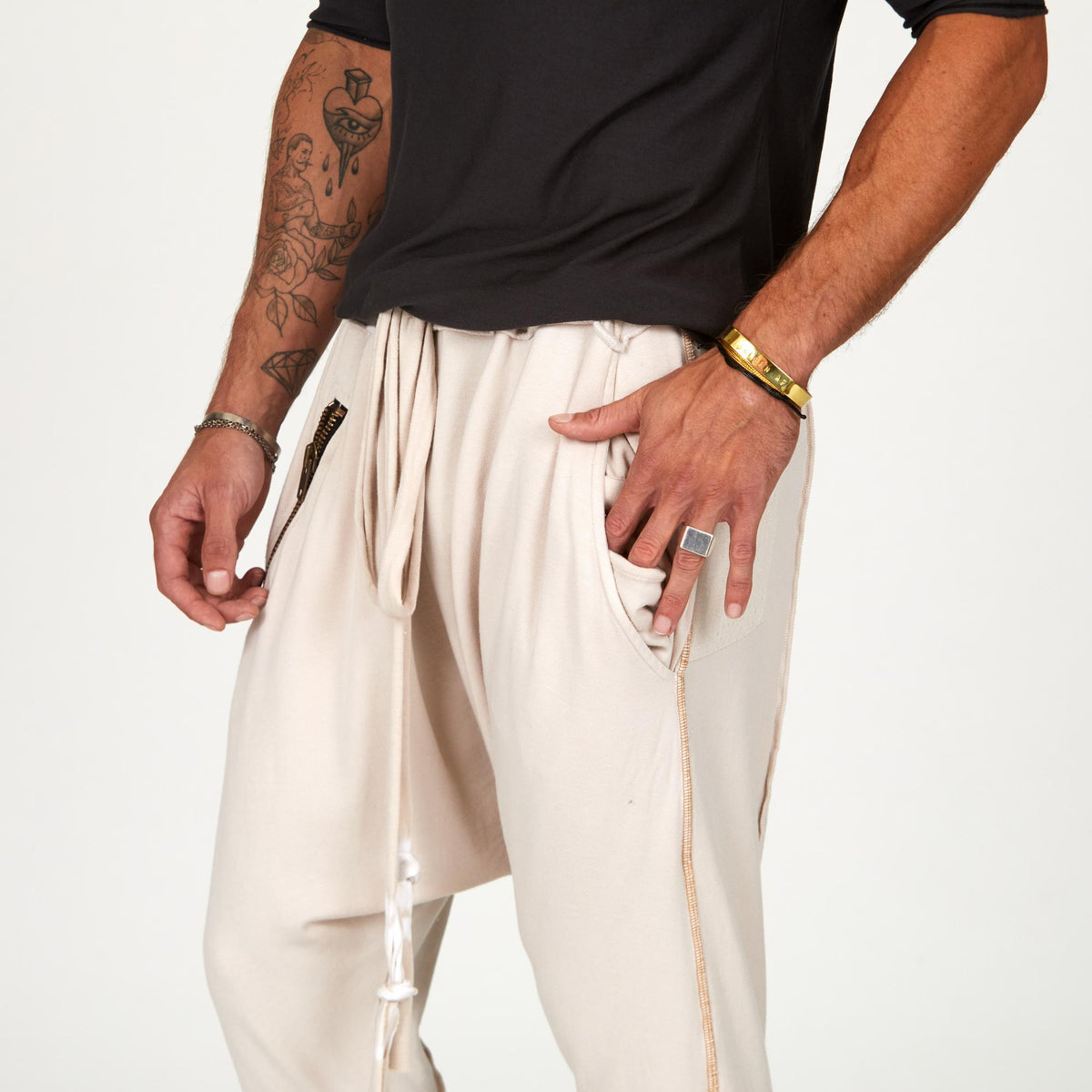 Male modeling White Stone colored pants