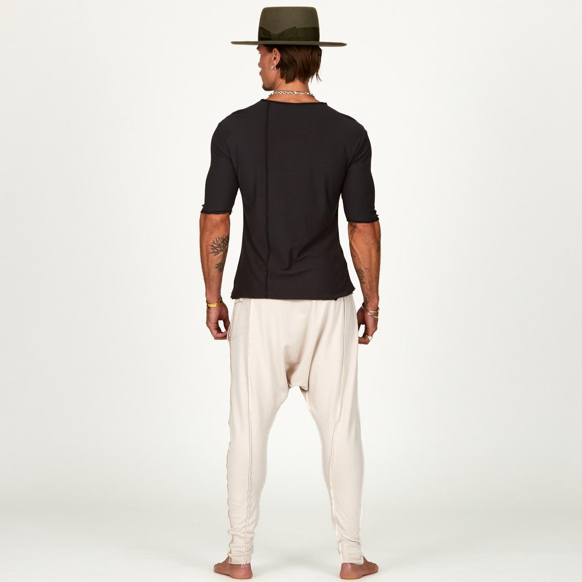 Male modeling White Stone colored pants