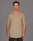 Male modeling tan crew neck shirt