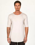 Male modeling white stone crew neck shirt 