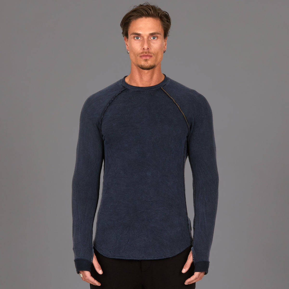 Male modeling dark blue mineral wash long sleeve raglan