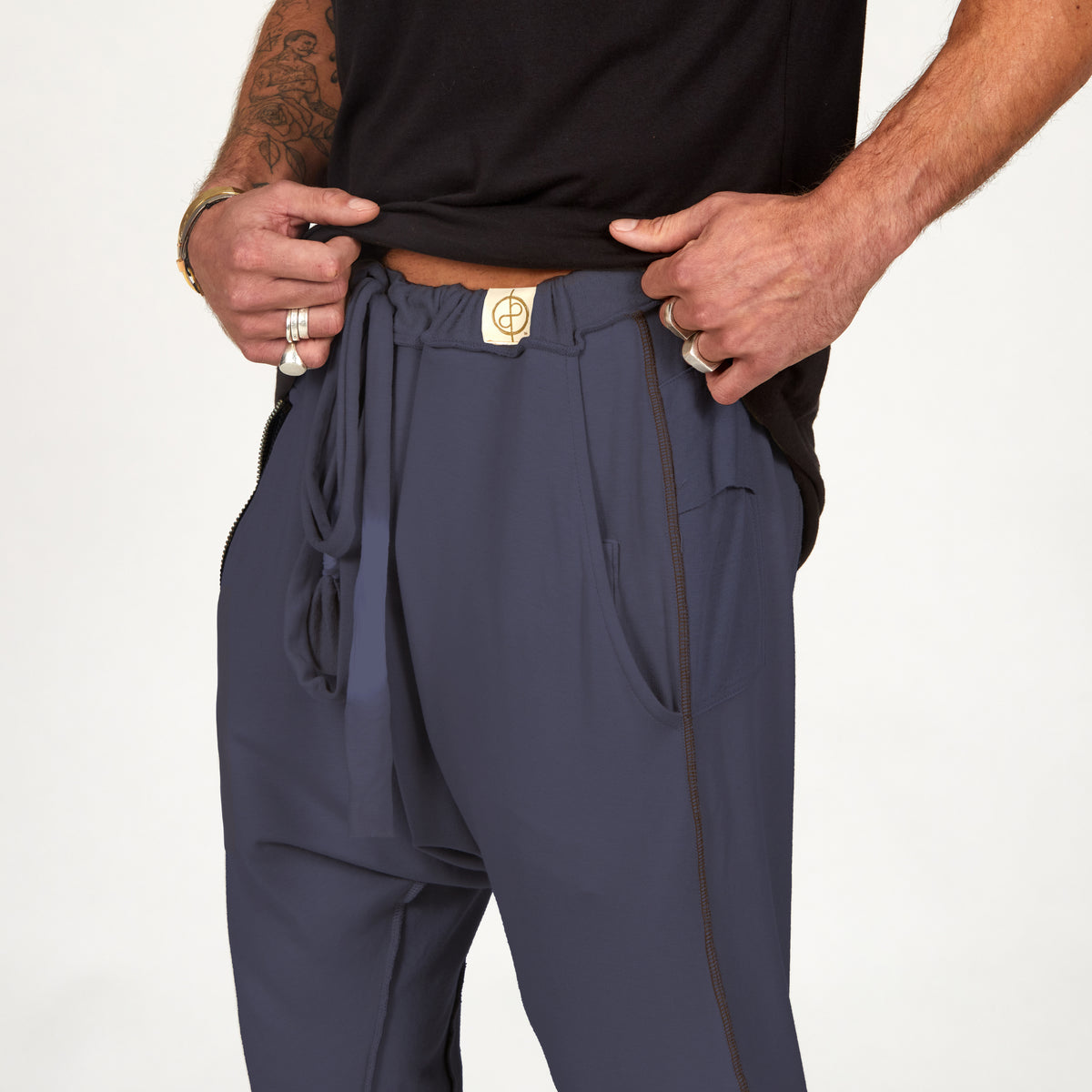 Male modeling Charcoal Blue colored pants