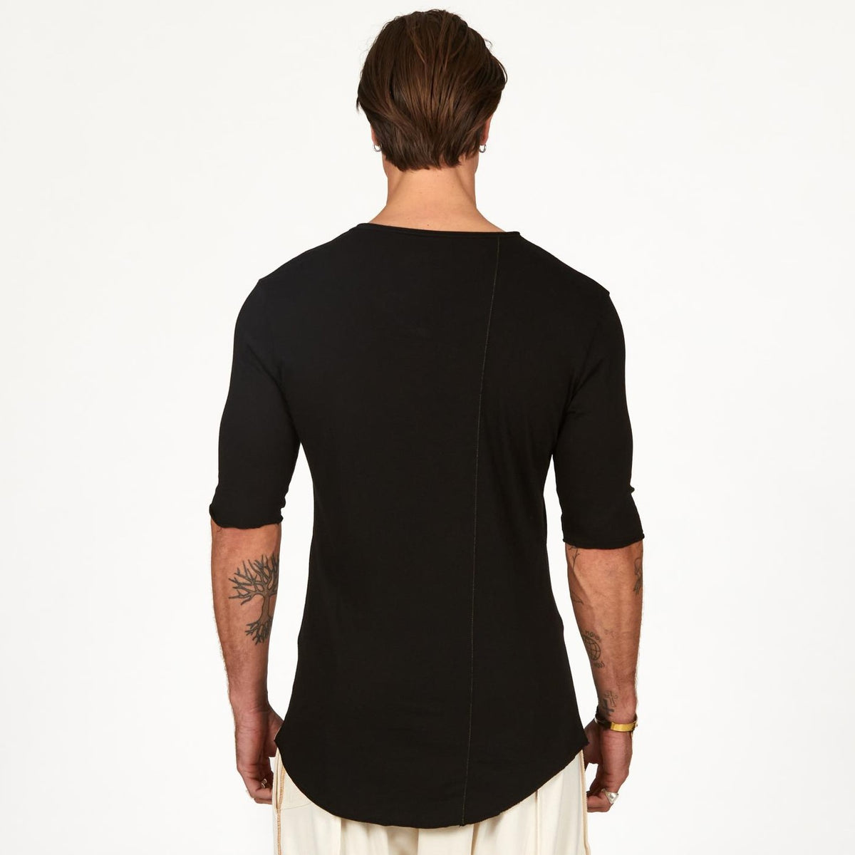 Male modeling black v neck shirt 