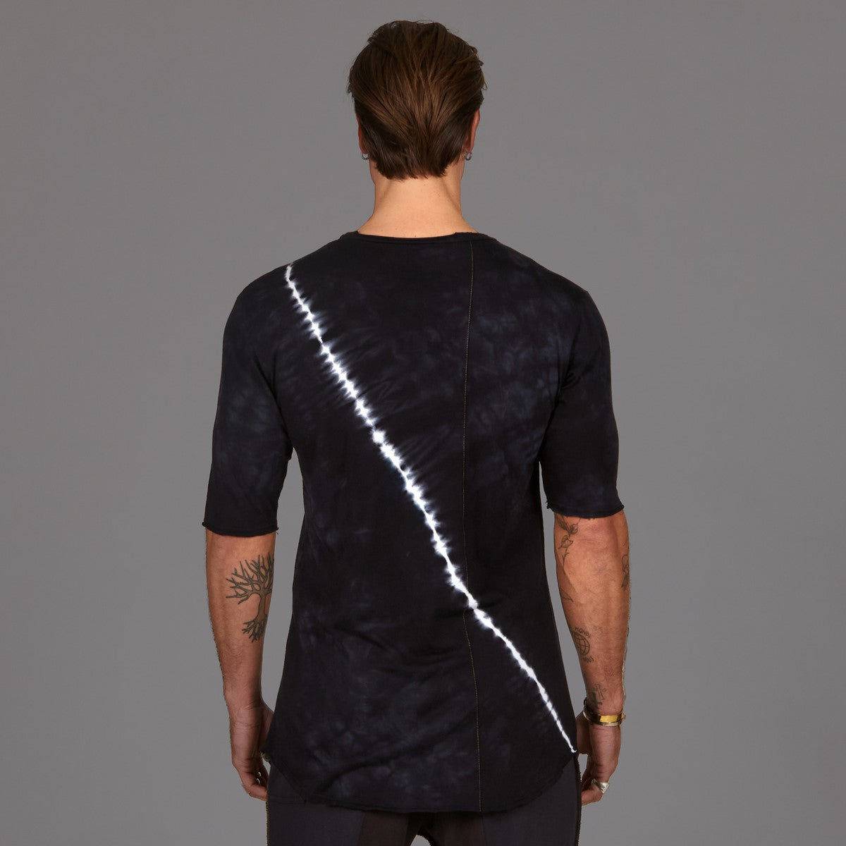 Male modeling light bolt crew neck shirt