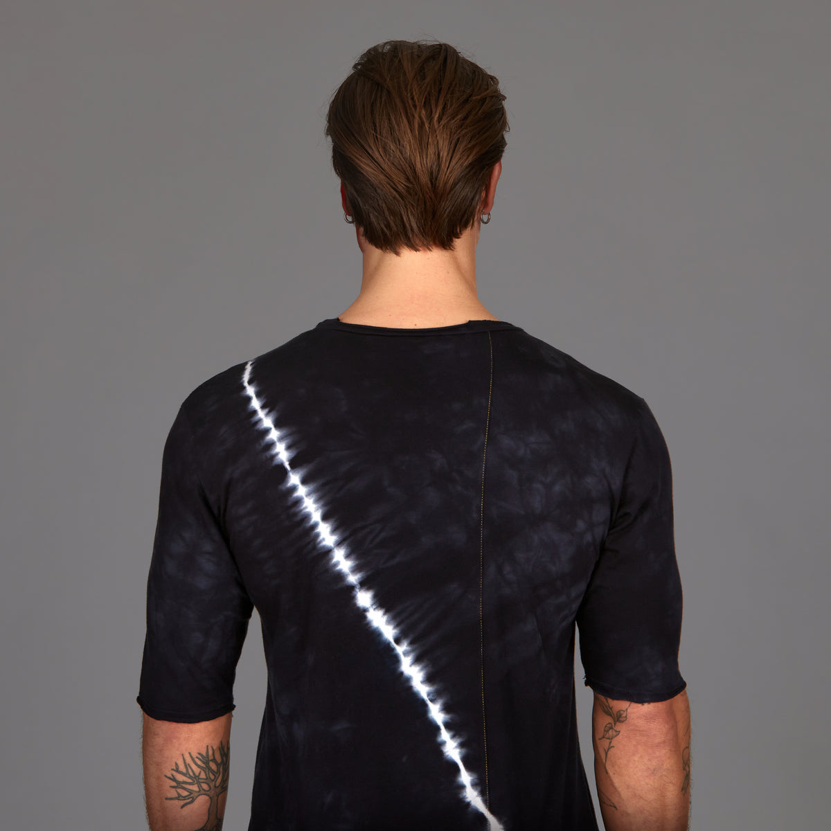 Male modeling light bolt crew neck shirt
