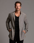 Male modeling Shacket in River Rock