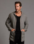 Male modeling Shacket in River Rock