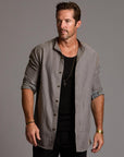 Male modeling Shacket in River Rock