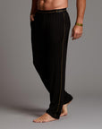 Male modeling the black tree silk pant