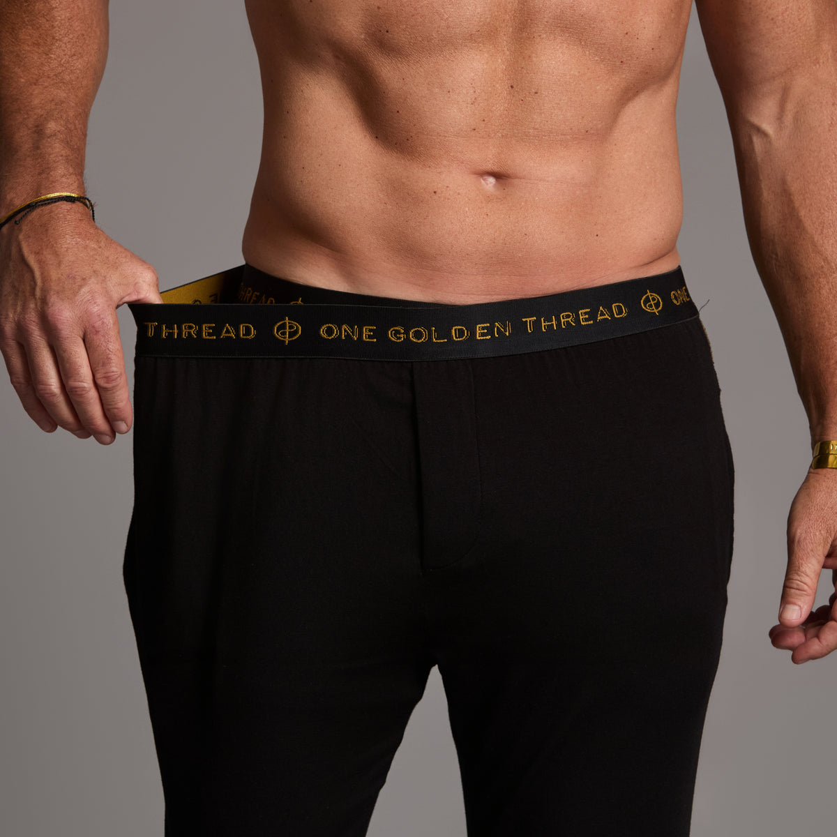 Male modeling the black tree silk pant