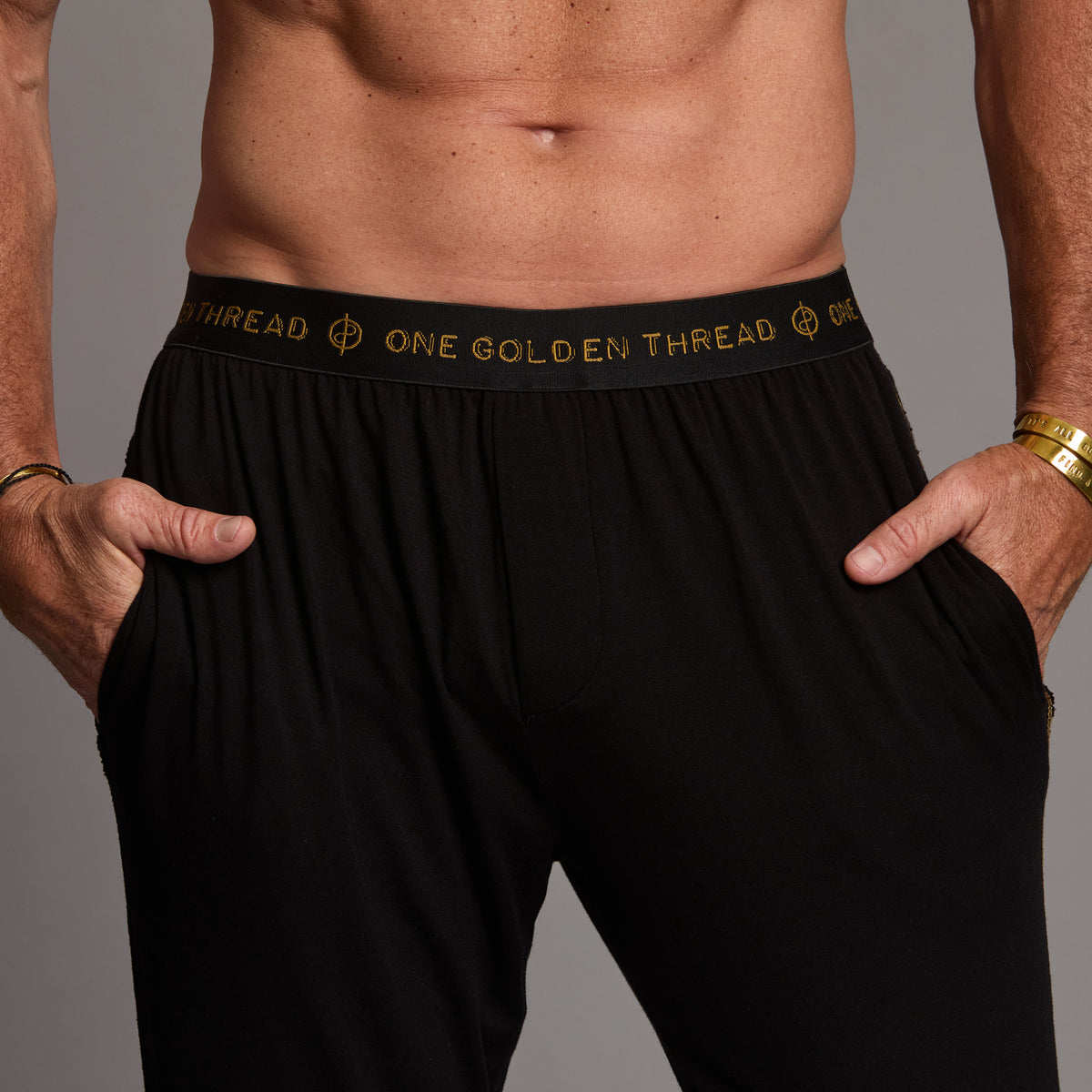 Male modeling the black tree silk pant