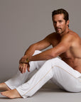 Male modeling the white tree silk pant