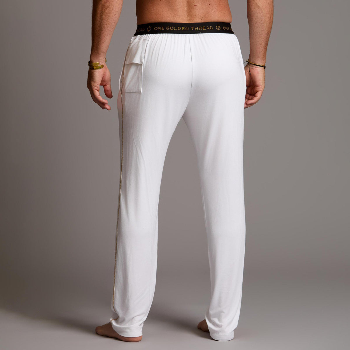 Male modeling the white tree silk pant