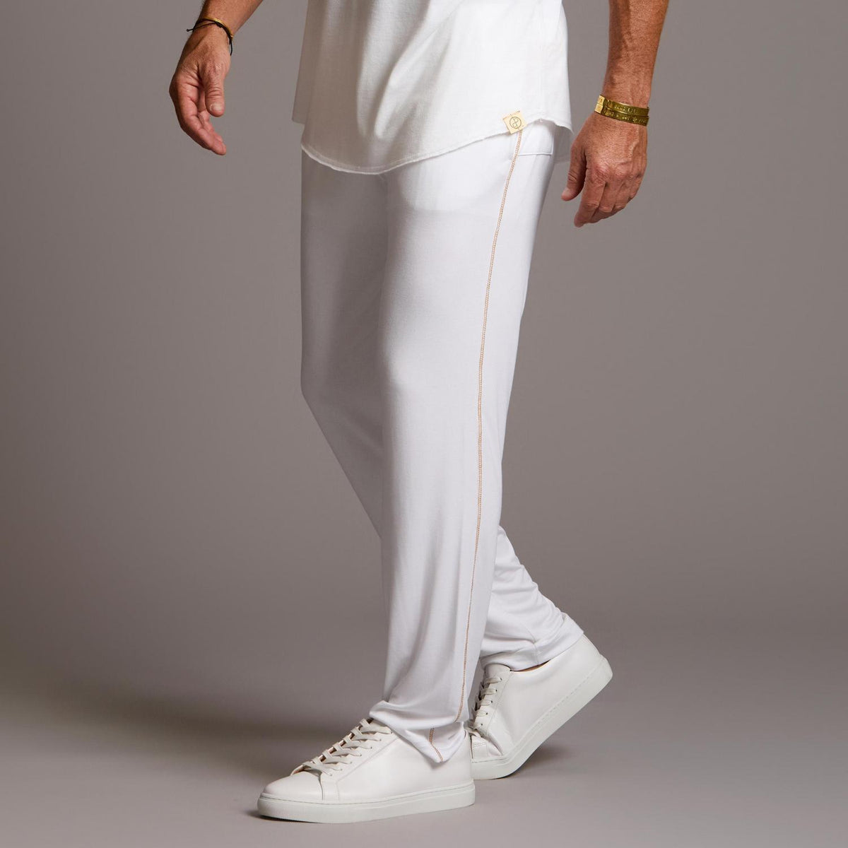 Male modeling the white tree silk pant
