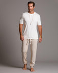 man modeling pants in white stone