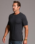 man modeling a tee in charcoal blue