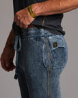 man modeling pants in mineral blue