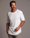Male modeling white crew neck shirt
