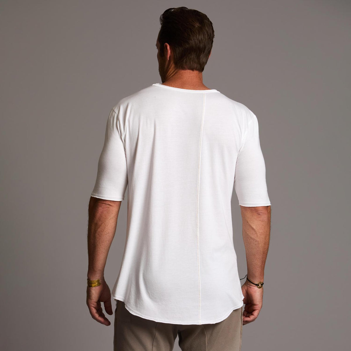 Male modeling white crew neck shirt