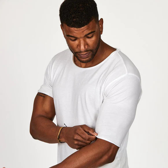 Male modeling white crew neck shirt 