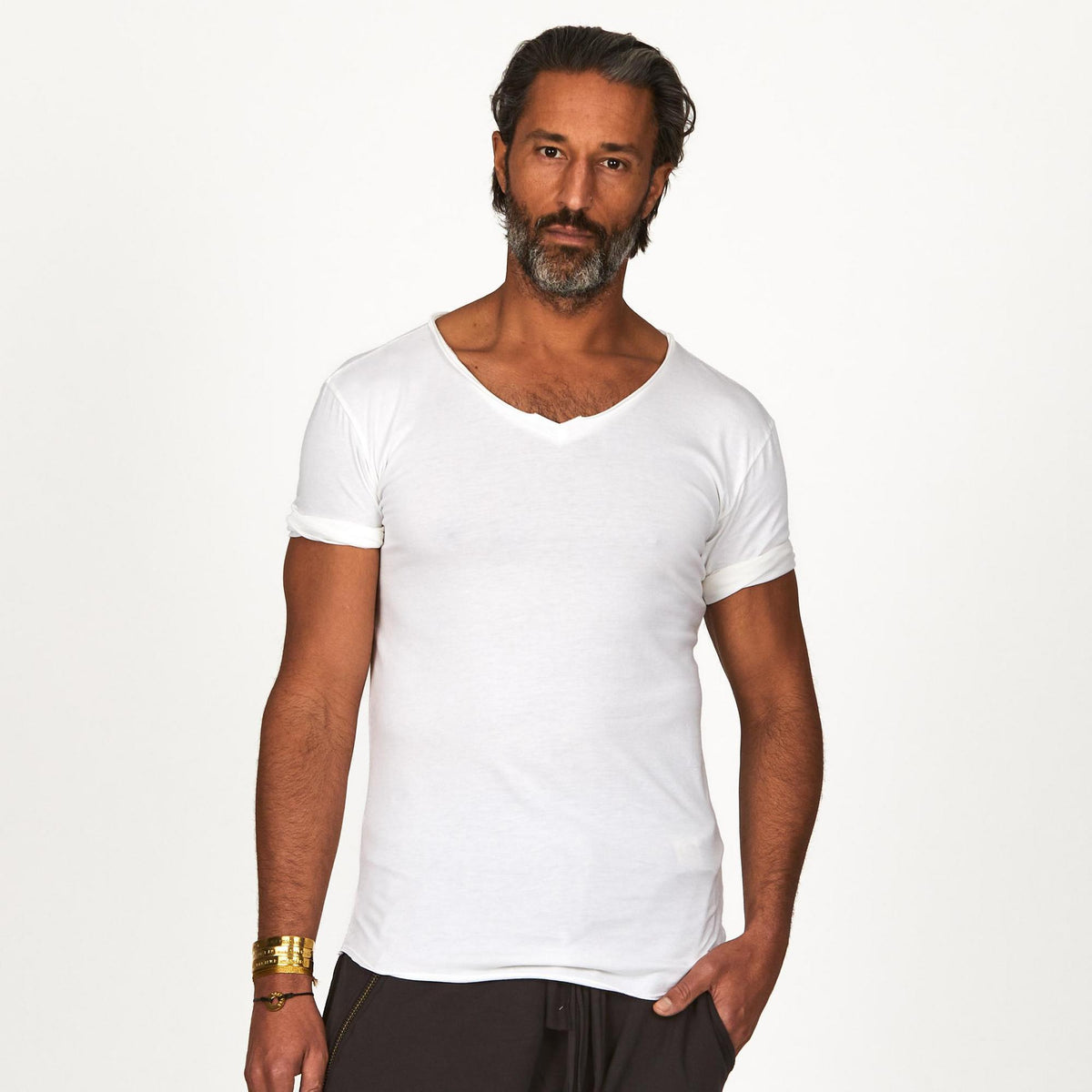 Male modeling white v neck shirt 