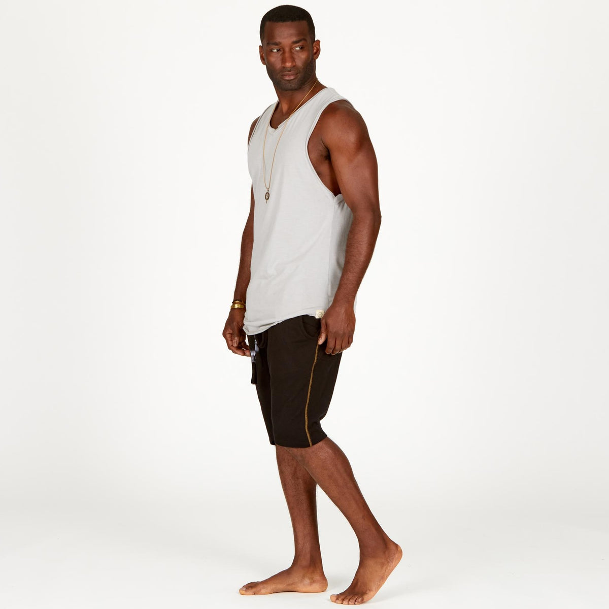 A man modeling black milanos mid shorts