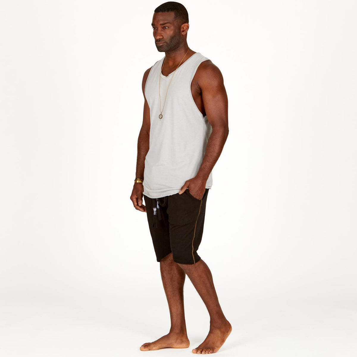 A man modeling black milanos mid shorts