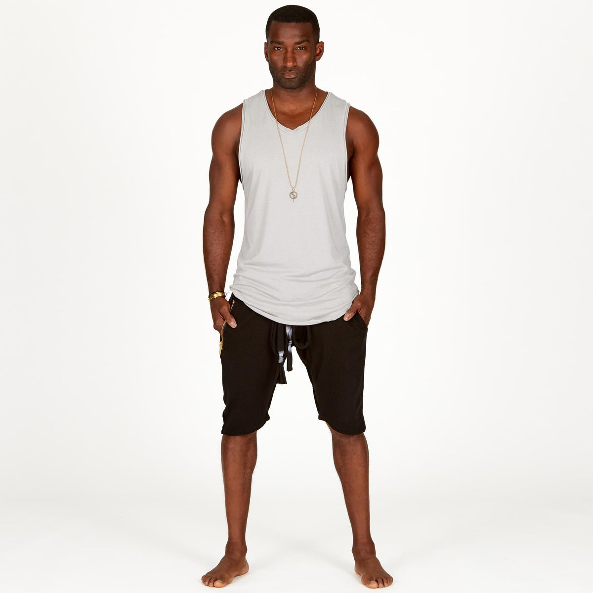 A man modeling black milanos mid shorts